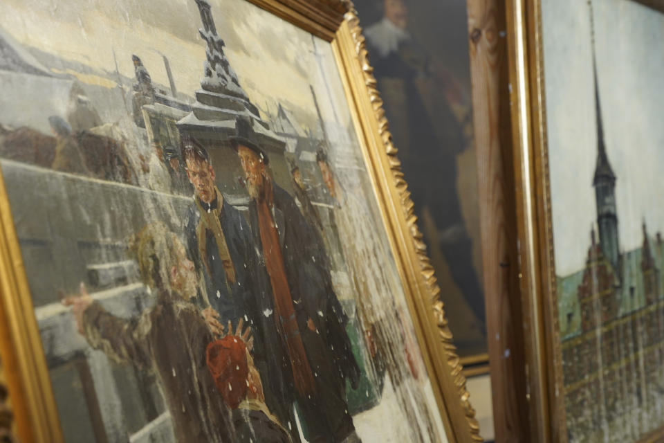 Artworks saved from Boersen during the fire are displayed at the National Museum's warehouse in Vinge, Denmark, on Tuesday, June 4, 2024. Boersen, in Copenhagen, caught fire on April 16, 2024. More than 300 art objects were saved from the burning building. (AP Photo/James Brooks)