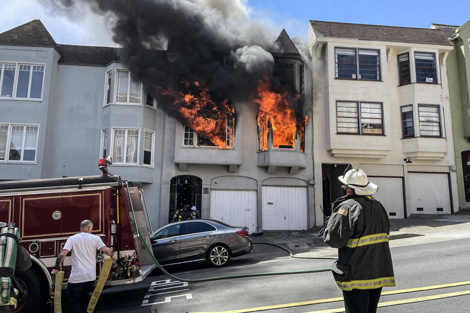 A fire in San Francisco's Alamo Square neighborhood (@SFFDPIO / via X)