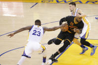 June 19, 2016; Oakland, CA, USA; Cleveland Cavaliers forward LeBron James (23) moves the ball against Golden State Warriors guard Klay Thompson (11) and forward Draymond Green (23) in the first half in game seven of the NBA Finals at Oracle Arena. Mandatory Credit: Kelley L Cox-USA TODAY Sports TPX IMAGES OF THE DAY