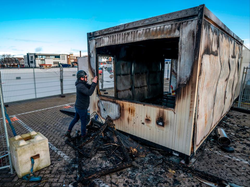 <p>Riot police were called in as young rioters torched a coronavirus test centre in Urk</p> (Jeroen Jumelet/ANP/AFP via Getty Images)