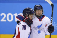 Ice Hockey - Pyeongchang 2018 Winter Olympics - Women’s Classification Match - Sweden v Korea - Kwandong Hockey Centre, Gangneung, South Korea - February 20, 2018 - Choi Ji-Yeon of Korea and her teammate Park Chae-lin react after the game. REUTERS/David W Cerny