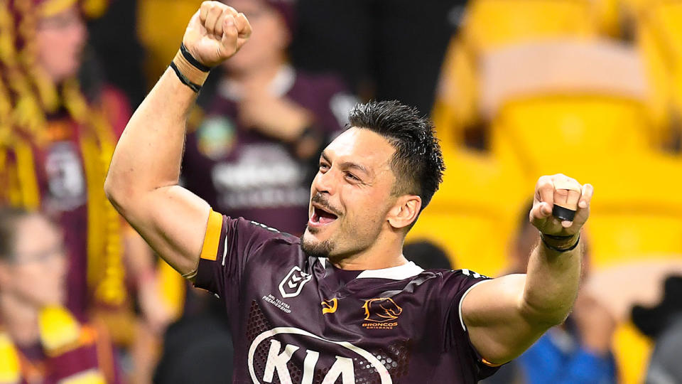 Pictured here, Alex Glenn celebrates during an NRL game for the Brisbane Broncos.