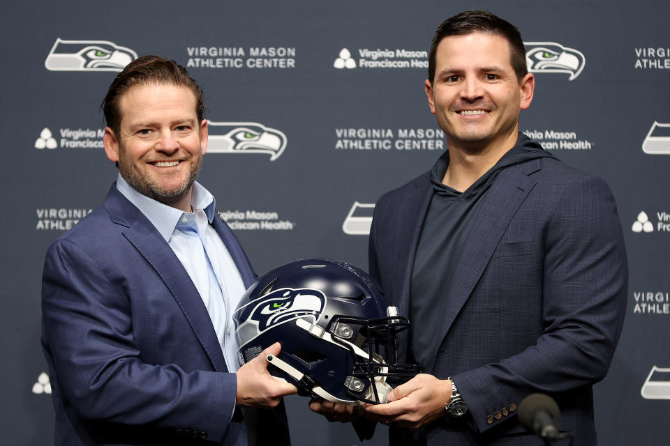 RENTON, WASHINGTON – FEBRUARY 01: John Schneider, general manager of the Seattle Seahawks, poses with Mike Macdonald as Macdonald is announced as the new Seattle Seahawks head coach at Virginia Mason Athletic Center on February 01, 2024 in Renton, Washington. (Photo by Steph Chambers/Getty Images)