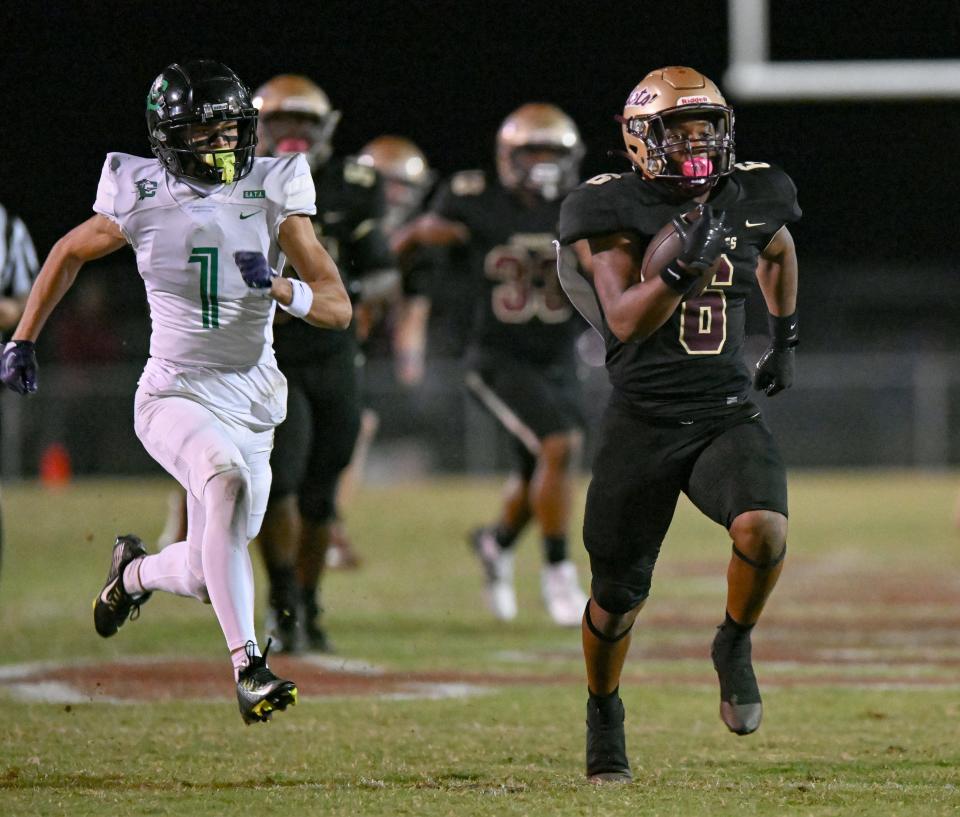 St. Augustine's Devonte Lyons sprints to the end zone for a touchdown.