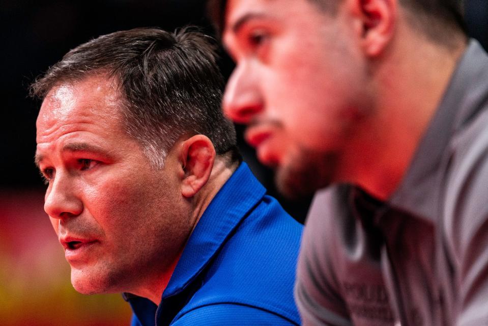 Poudre wrestling coach Barrett Golyer watches an Impala wrestler during a first-round match at the Colorado state wrestling tournament at Ball Arena on Thursday, Feb. 16, 2023 in Denver, Colo.