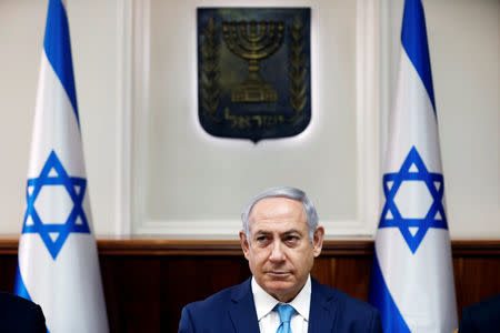 Israeli Prime Minister Benjamin Netanyahu attends the weekly cabinet meeting at the Prime Minister's office in Jerusalem February 11, 2018. REUTERS/Ronen Zvulun