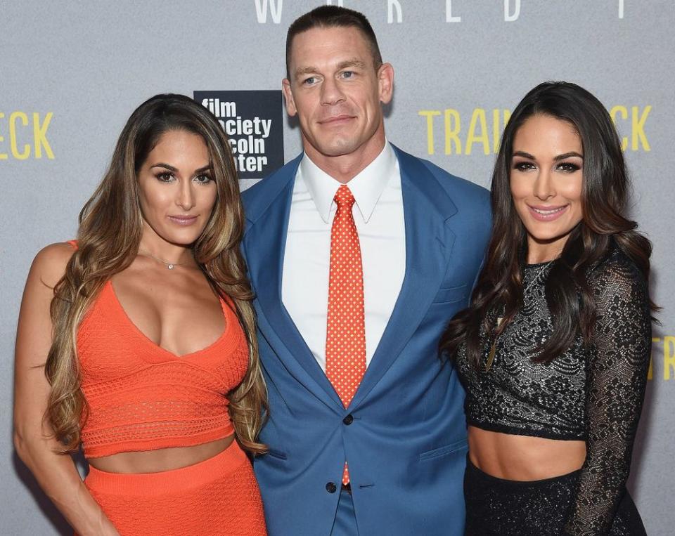 From left: Brie Bella, John Cena and Nikki Bella