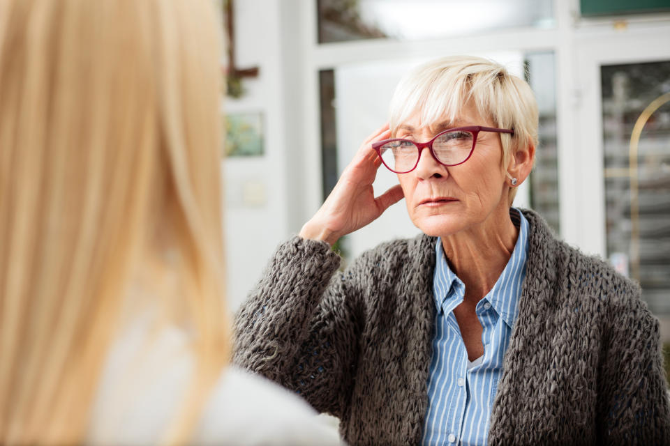 frustrated older woman at the store