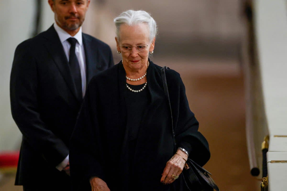 Queen Margrethe II and Prince Frederik pay their respects at the coffin of Queen Elizabeth II (POOL/AFP via Getty Images)