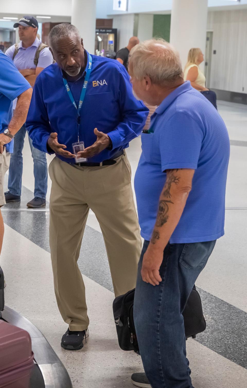 Earnest Cobble assists an arriving passenger at BNA Monday, July 25, 2022; Nashville, TN