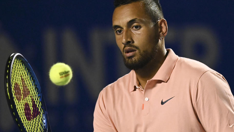 Nick Kyrgios responded angrily after he was compared to Bernard Tomic by someone on social media. (Photo by PEDRO PARDO/AFP via Getty Images)