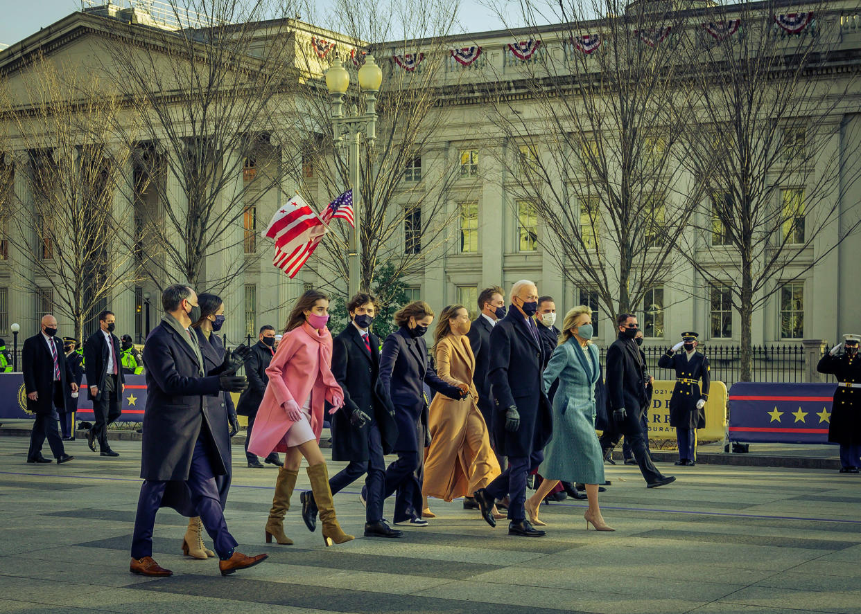 President Joe Biden, first lady Dr. Jill Biden and family walk on Pennsylvania Avenue during the 59th presidential inauguration parade.