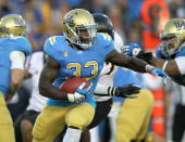 PASADENA, CA - NOVEMBER 05: Running back Derrick Coleman #33 of the UCLA Bruins carries the ball against the Arizona State Sun Devils at the Rose Bowl on November 5, 2011 in Pasadena, California. (Photo by Stephen Dunn/Getty Images)