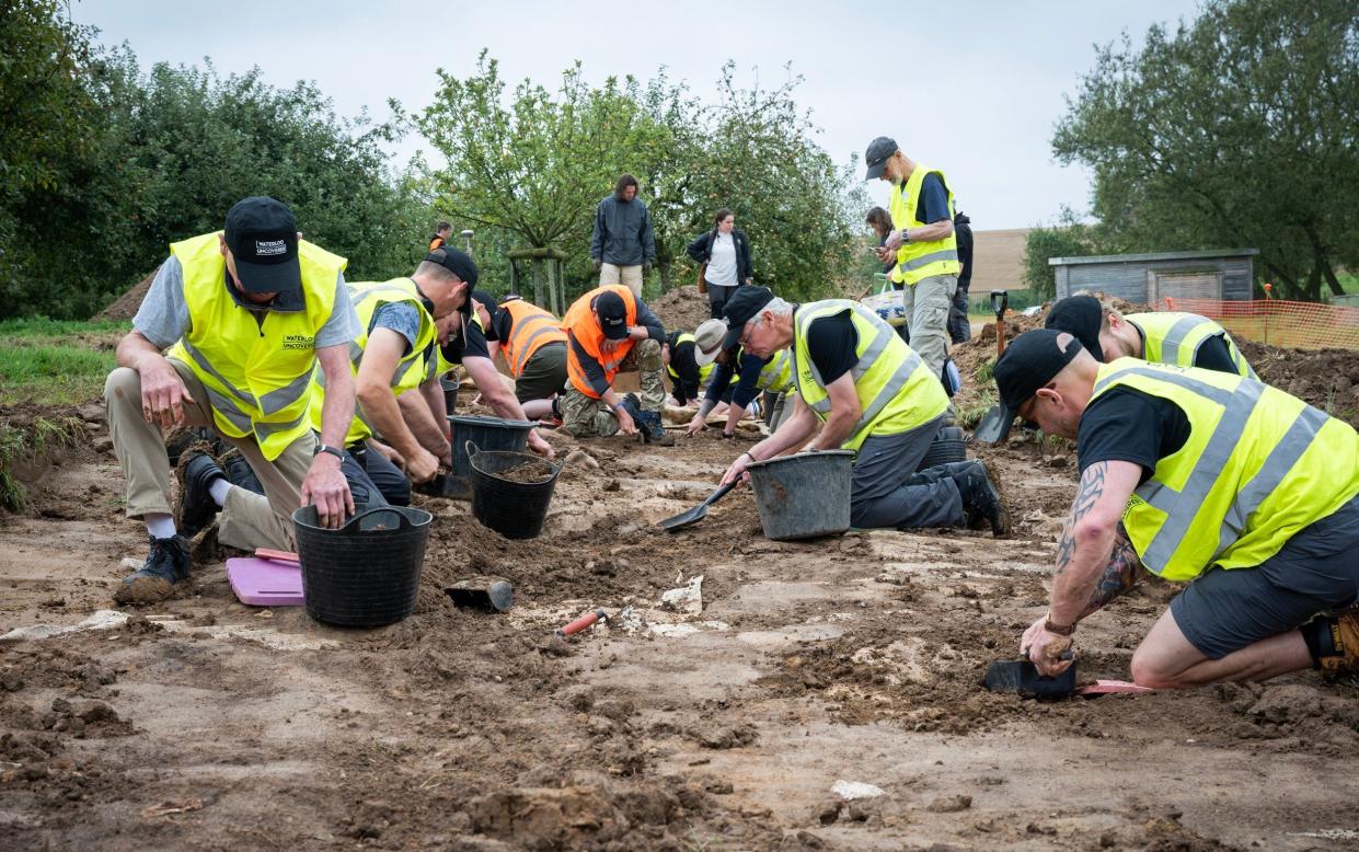 Members of Waterloo Uncovered excavate the battlefield in Belgium