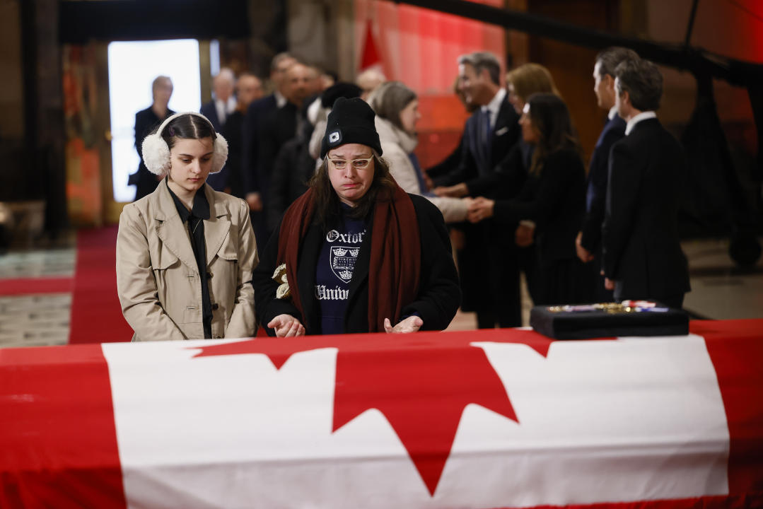 People pay their respects as former prime minister Brian Mulroney lies in state in the Sir John A. Macdonald building opposite Parliament Hill in Ottawa, on Tuesday, March 19, 2024. THE CANADIAN PRESS/Blair Gable-Pool