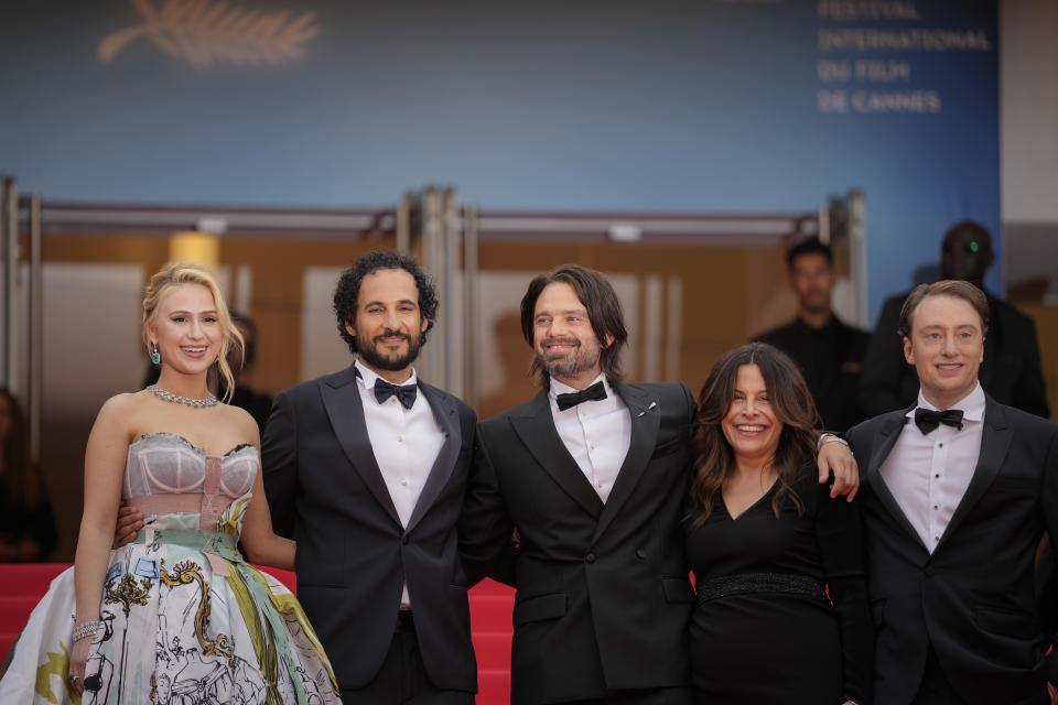 Maria Bakalova, from left, director Ali Abbasi, Sebastian Stan, Amy Baer, and Gabriel Sherman pose for photographers upon arrival at the premiere of the film 'The Apprentice' at the 77th international film festival, Cannes, southern France, Monday, May 20, 2024. (Photo by Andreea Alexandru/Invision/AP)