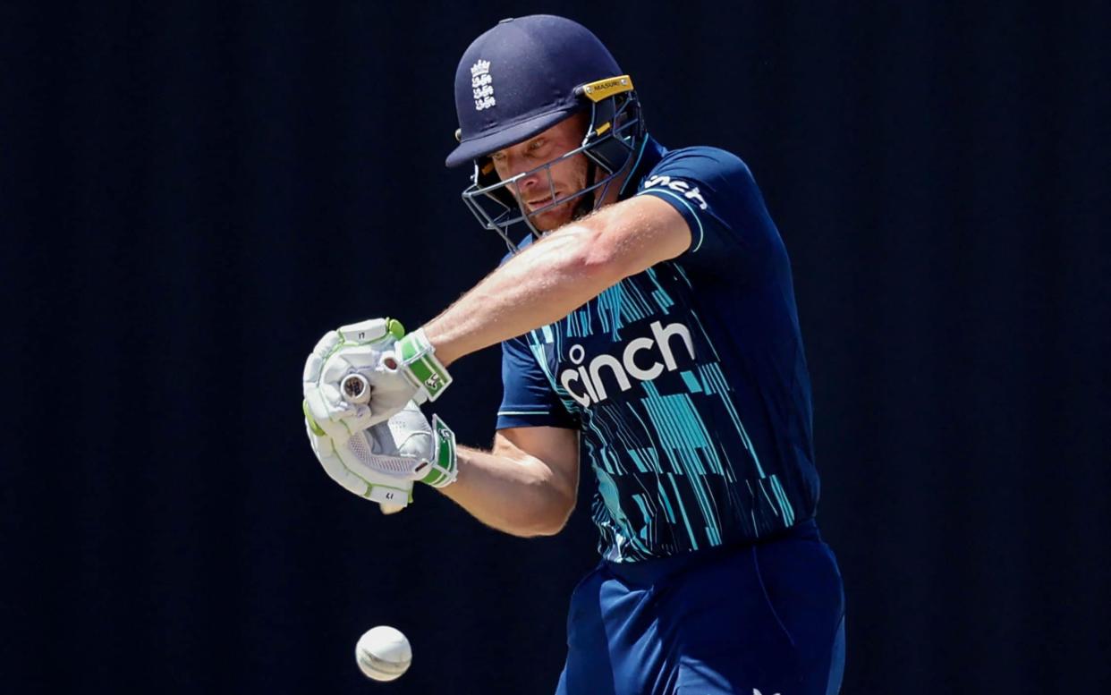 England's Captain Jos Buttler watches the ball as he plays a shot during the third one day international (ODI) cricket match between South Africa and England at Mangaung Oval in Kimberley on February 1, 2023 - MARCO LONGARI/AFP via Getty Images