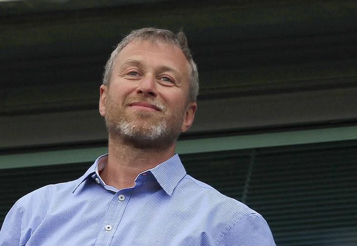 FILE PHOTO: Chelsea owner Roman Abramovich watches the players do a lap of honour after their English Premier League soccer match against Blackburn Rovers in London