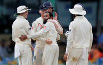 Cricket - England v Sri Lanka, Third Test - Colombo, Sri Lanka - November 24, 2018. England's Adil Rashid celebrates with his teammates after taking the wicket of Sri Lanka's Malinda Pushpakumara (not pictured). REUTERS/Dinuka Liyanawatte