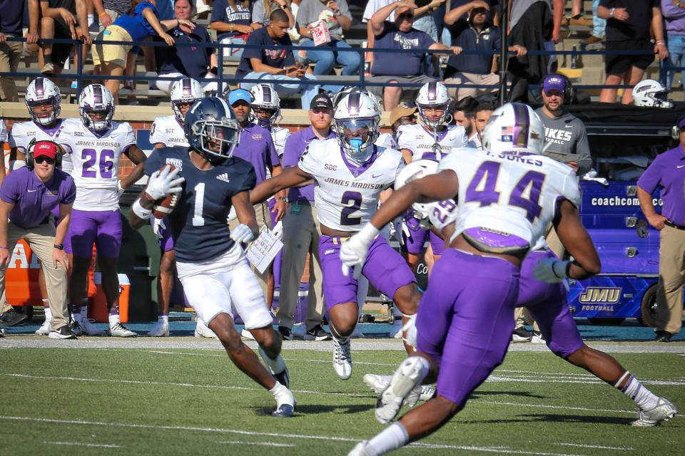 Georgia Southern's Jeremy Singleton (1) makes one of his seven receptions early in a wild matchup with James Madison on Oct. 15 at Paulson Stadium in Statesboro.