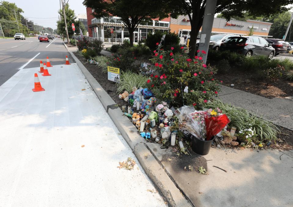 The shoulder of Mamaroneck Avenue at New Street has been freshly painted, at the site of a memorial to Molly Murphey Donovan and her son, Mikey, who were killed crossing the busy road on their way to Mamaroneck Avenue School on June 20.