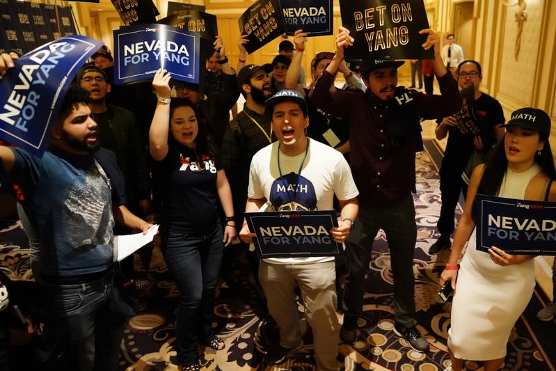 Supporters of Andrew Yang cheer outside a First in the West Event at the Bellagio Hotel in Las Vegas