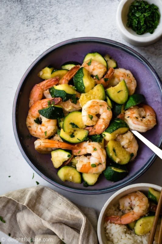 <p>Delightful Plate</p><p>This easy recipe showcases the natural sweetness of shrimp and zucchini. The addition of garlic and lemon juice makes the dish flavorful and delicious. It is a quick and easy one-pan meal for busy days.</p><p><strong>Get the recipe: <a href="https://delightfulplate.com/freaking-fast-sauteed-shrimp-zucchini/" rel="nofollow noopener" target="_blank" data-ylk="slk:One-Pan Sauteed Shrimp and Zucchini;elm:context_link;itc:0;sec:content-canvas" class="link ">One-Pan Sauteed Shrimp and Zucchini</a></strong></p>