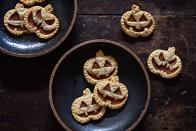 <p>Even if you can't pull off a homemade pumpkin pie, you can definitely master these adorable hand pies.</p><p>Get the recipe from <a href="https://www.delish.com/cooking/recipe-ideas/recipes/a43939/mini-jack-o-lantern-pies-recipe/" rel="nofollow noopener" target="_blank" data-ylk="slk:Delish;elm:context_link;itc:0;sec:content-canvas" class="link ">Delish</a>.</p>