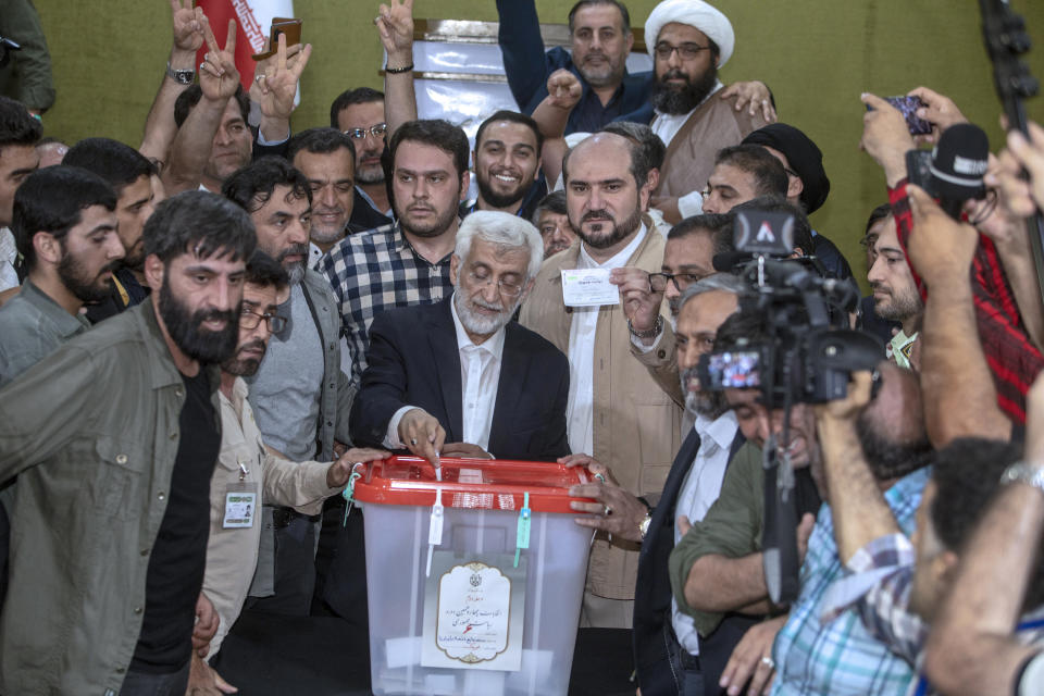 Candidate for the Iran's presidential election Saeed Jalili, a hard-line former nuclear negotiator, casts his vote for the presidential runoff election at a polling station in Qarchak near Tehran, Iran, Friday, July 5, 2024. Iran was holding a runoff presidential election Friday pitting a hard-line former nuclear negotiator against a reformist lawmaker, though both men earlier struggled to convince a skeptical public to cast ballots in the first round that saw the lowest turnout in the Islamic Republic's history. (AP Photo)