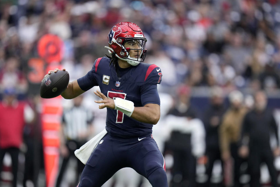 Houston Texans quarterback C.J. Stroud (7) drops back to pass in the first half of an NFL football game against the Arizona Cardinals in Houston, Sunday, Nov. 19, 2023. (AP Photo/Eric Christian Smith)