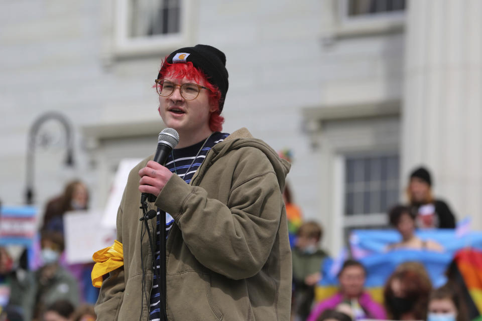 Charlie Draughn, of Chisago, Minnesota, speaks at the Vermont Statehouse in Montpelier, on Friday March 31, 2023 in support of transgender rights. The Vermont rally is one of many being held across the country on Friday. Draugh, who attends boarding school in Vermont said he was angry that groups are trying to control his life and turn him into something he is not.The rallies come at a time when Republicans in some state legislatures across the country are considering hundreds of separate bills that would limit transgender rights. (AP Photo/Wilson Ring)