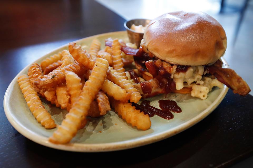 The Dirty South Burger with Gouda Mac & Cheese, Bacon, Apple Butter BBQ Sauce from Southern Prospect in Watkinsville, Ga.