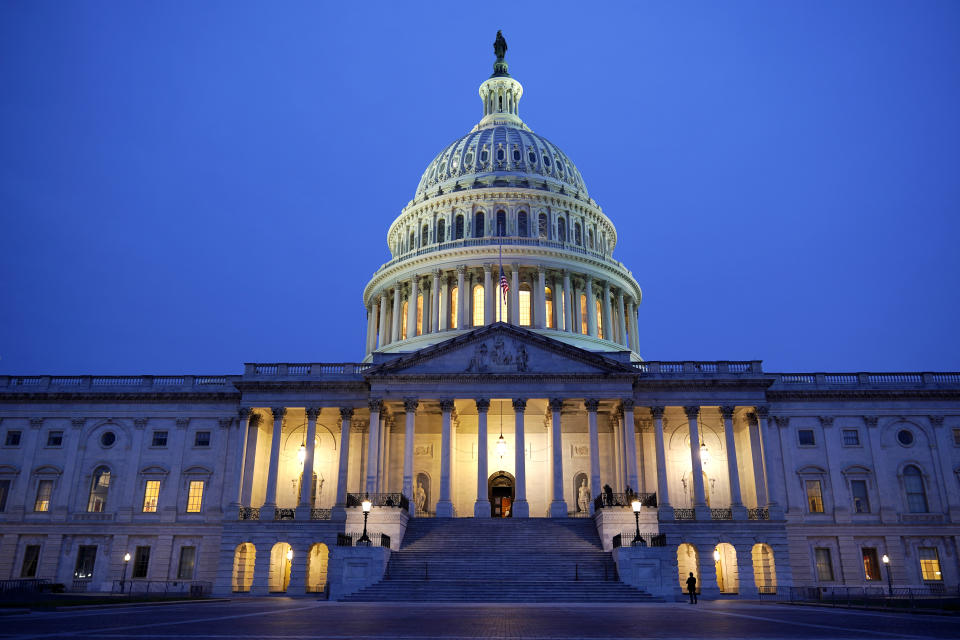 The early morning U.S. Capitol awaits the arrival of the flag-draped casket of Justice Ruth Bader Ginsburg that will lie in state at the U.S. Capitol, Friday, Sept. 25, 2020, in Washington. (AP Photo/J. Scott Applewhite)