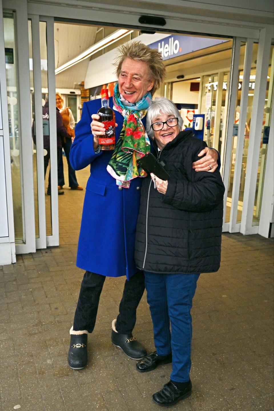 Sir Rod Stewart seemed in good spirits as he posed for pictures with shoppers and supermarket workers (Dave Benett)