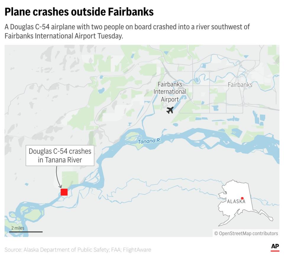 The plane, a  Douglas DC-4, was carrying two people when it crashed into the Tanana River near to Fairbanks International Airport on Tuesday morning at around 10am local time (AP)