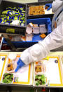 Meals are prepared by employees of LSG Group, Lufthansa's airline catering division, at the LSG headquarters in Frankfurt, Germany, November 11, 2016. REUTERS/Kai Pfaffenbach