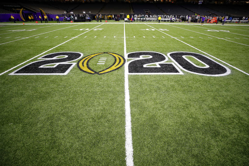 The CFB 2020 logo is displayed on the field prior to the College Football Playoff title game between LSU and Clemson on Jan. 13, 2020. (Todd Kirkland/Icon Sportswire/Getty Images)