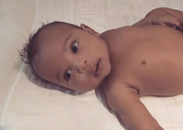 Kim Kardashian may be a controversial Instagrammer, but no one could possibly criticize her most recent snap! The reality TV starlet shared an adorable second photo of her baby Saint West. "You're the sun in my morning babe," she captioned the precious photo of the bright-eyes baby on March 11, 2016.