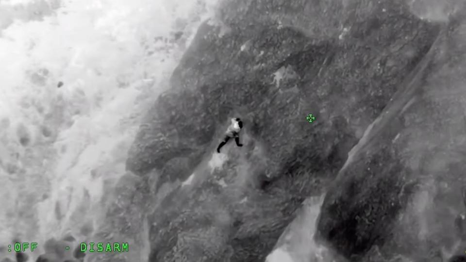 PHOTO: In this footage released by the Sonoma County Sheriff's Office, Cody Cretini is seen moments before being rescued from a California cliff.  (Sonoma County Sheriff)