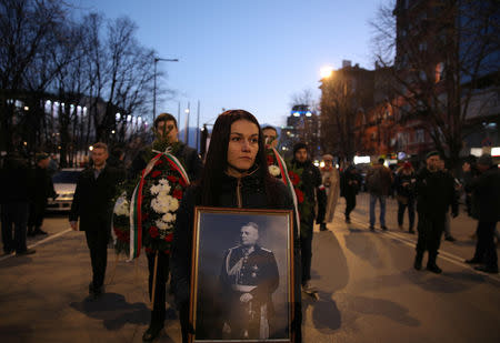 A supporter of a nationalist organization takes part in a march in commemoration of late General Hristo Lukov, a Bulgarian army commander, in Sofia, Bulgaria, February 16, 2019. REUTERS/Stoyan Nenov