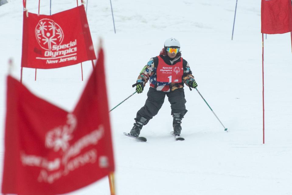 Amber Concepcion, of Union City, comes down the hill during a time trial. The NJ Special Olympics hold their State Games at Mountain Creek in Vernon, N.J. on Monday Feb. 7, 2022. Hundreds of athletes compete in different events on the slopes.