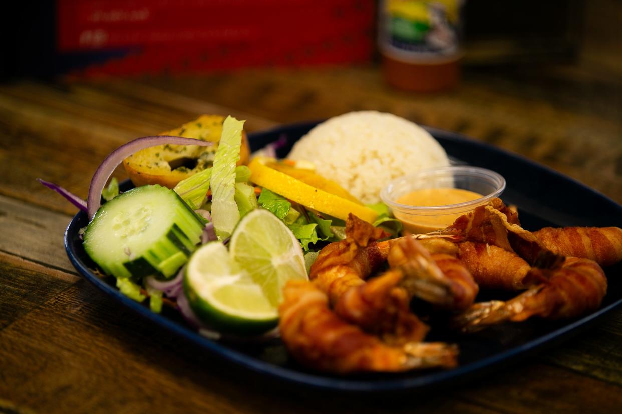 The Camarones Momias is a dish available at Mariscos Altamar, a new Mexican seafood restaurant in Corpus Christi. The dish comes with big shrimp wrapped in bacon.