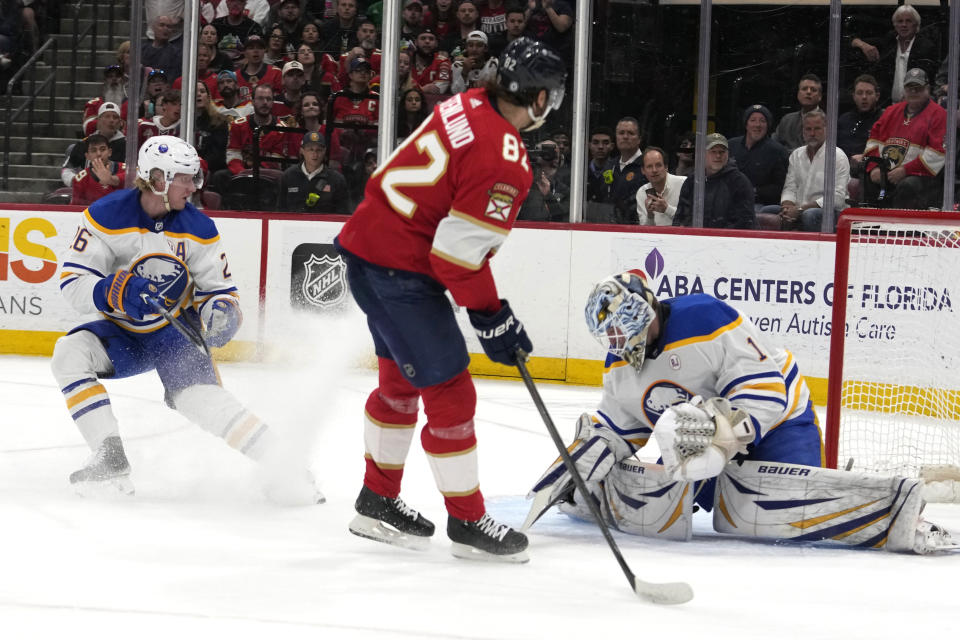 Florida Panthers center Kevin Stenlund (82) scores against Buffalo Sabres goaltender Ukko-Pekka Luukkonenm, right, during the first period of an NHL hockey game, Saturday, April 13, 2024, in Sunrise, Fla. (AP Photo/Lynne Sladky)