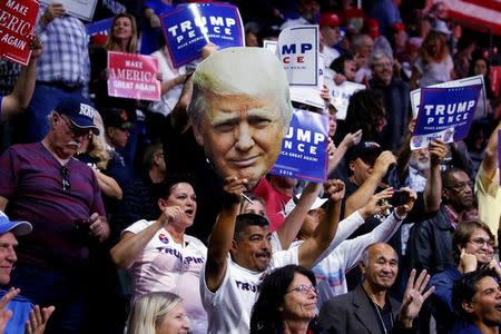 Supporters of Republican presidential nominee Donald Trump cheer during a campaign rally in Everett, Washington, U.S., August 30, 2016. Picture taken August 30, 2016. REUTERS/Carlo Allegri