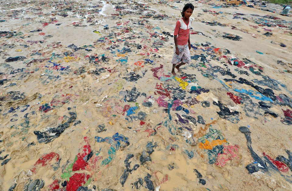 <p>Discarded items of clothing in a Rohingya refugee camp in Cox’s Bazar, Bangladesh, Sept. 20, 2017. (Photo: Cathal McNaughton/Reuters) </p>