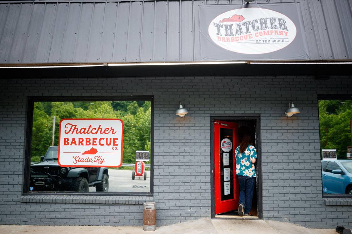 A customer enters the restaurant on Sunday, June 12, 2022, at Thatcher Barbecue Company in Slade, Kentucky.