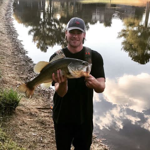 <p>Josh Rutledge Instagram</p> Laura Rutledge's husband, Josh Rutledge, posing for a photo while holding a fish