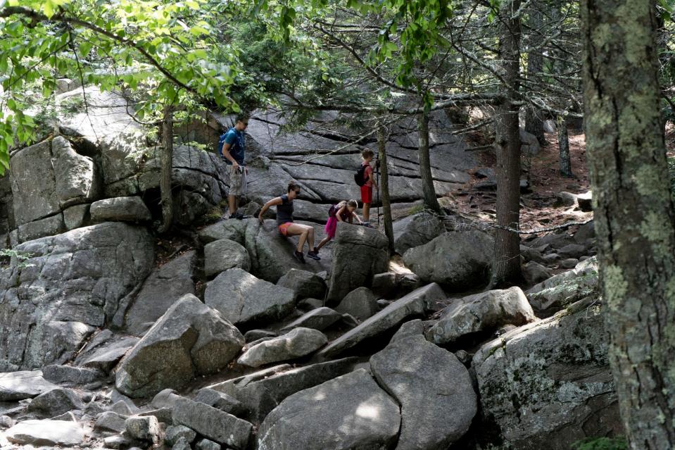 Hikers enjoy Purgatory Chasm in Sutton.