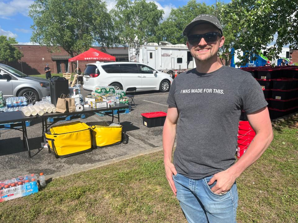 Michael Baker, executive pastor at Destiny Church in Columbia, leads the tornado relief recovery site at Randolph Howell Elementary School on Friday, May 10, 2024 in Columbia, Tenn.