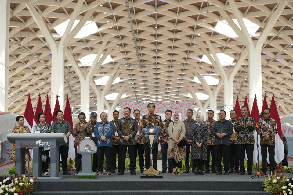 Indonesian President Joko widodo, center, deliver his speech during the opening ceremony for launching Southeast Asia's first high-speed railway at Halim station in Jakarta, Indonesia, Monday, Oct. 2, 2023. Indonesian President Joko Widodo launched Southeast Asia's first high-speed railway that will start its commercial operations on Monday, a key project under China's Belt and Road infrastructure initiative that will cut travel time between two cities from the current three hours to about 40 minutes. (AP Photo/Achmad Ibrahim)